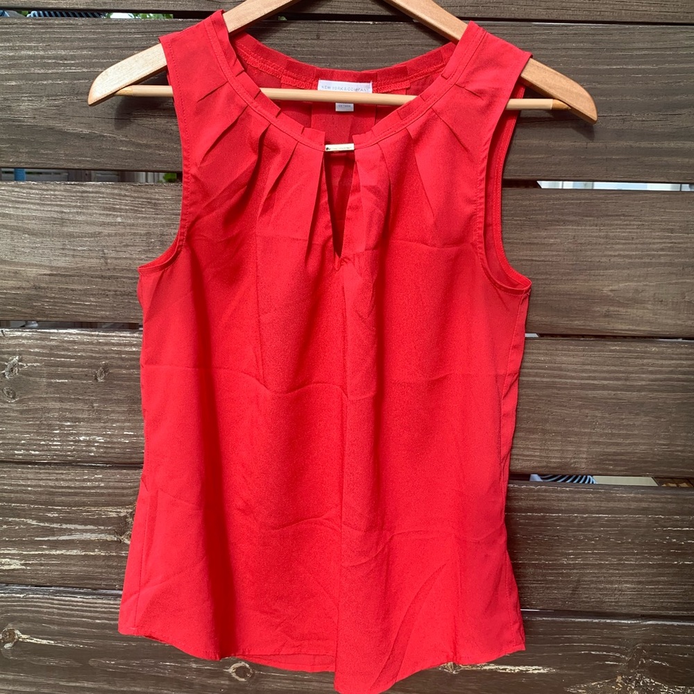 Coral sleeveless blouse